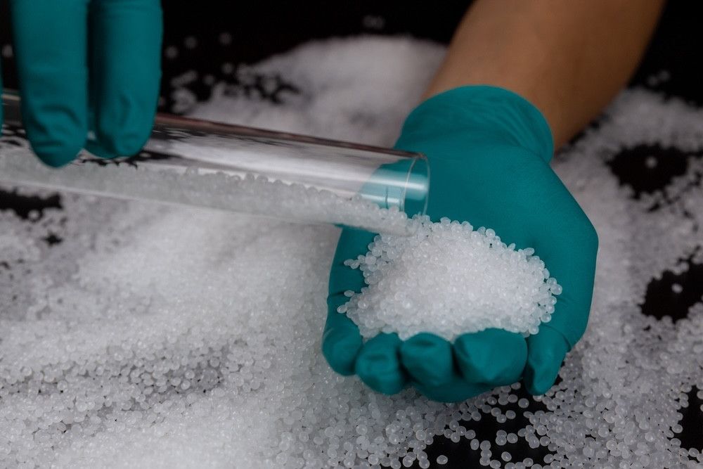 Acetate granules produced from CO2 emissions through Again's innovative conversion process.